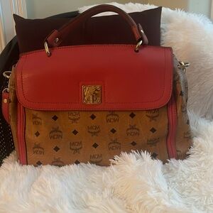Mcm monogram  with red strap adjustable and handle bag and detachable strap